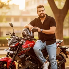 A more casual moment with a red sports bike. This captures the freedom and fun that is at the core of my music philosophy. Maza aa raha hai ki nahi?