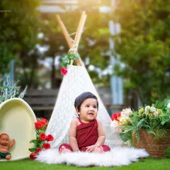 This outdoor session combines a boho teepee with a cute heart-shaped prop. I can customize outdoor setups just as creatively as my indoor ones.