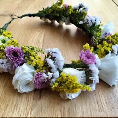 A delicate and beautiful floral crown, or 'tiara', handcrafted by our team. This is a perfect accessory for brides, bridesmaids, or for a maternity photoshoot.