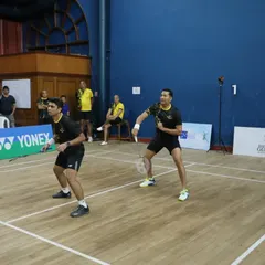 Players in position during a competitive doubles match at the 29th GD Birla Memorial Tournament. We manage events at prestigious venues like the Bombay Gymkhana.