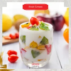 A refreshing glass of Fruit Cream. This simple yet delicious dessert is made with fresh seasonal fruits mixed in sweet cream, a light option to end your meal.
