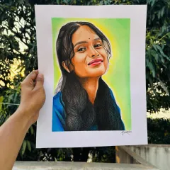 Capturing a warm smile and the light in someone's eyes is my passion. This vibrant color pencil portrait took over 50 hours, layering colors to get the skin tones just right and make the portrait pop. This is a great example of a commission from Mumbai.