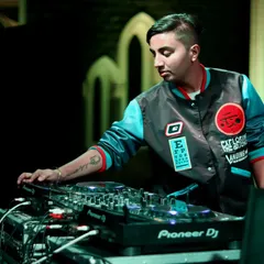 A focused shot of me at the decks. This highlights my professional Pioneer DJ setup and my concentration while performing.