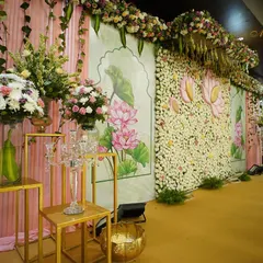 And here is the final result. This photo shows the 'Lotus Love' backdrop, brought to life with a wall of real flowers and hand-painted panels, just as we planned in the mockup.
