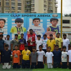 Another shot of our enthusiastic students from BNR Public School with our head coach. We work closely with schools to provide structured sports programs that complement their academic curriculum.