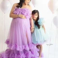 A quiet moment between a mother-to-be and her daughter. This maternity photo captures the love and excitement as the family prepares to welcome a new member.