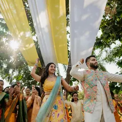 A collection of fun and vibrant moments from a sun-drenched Haldi. From playful entries to candid portraits, we capture the complete story of this joyous celebration.