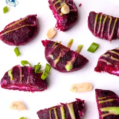 Our cheese stuffed Beetroot Galouti kebabs are soft, rich, and melt in your mouth. Drizzled with a mint chutney aioli, these are a vegetarian delight your guests will remember.