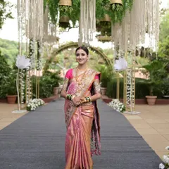 A beautiful Maharashtrian bride ready for her reception. I draped this Kanjeevaram Tissue saree in a Nivi style with fluffy center pleats to create a look of pure elegance and grace for her celebration.