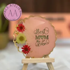 "Best Mom Ever" captured in a beautiful pink floral resin frame. These small frames come with an easel and are a heartfelt gift for Mother's Day or her birthday.