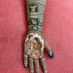 A close-up of the "Mom" side, featuring the couple's portrait and a baby face motif at the top.