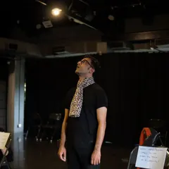 A quiet moment during a photoshoot for First Drop Theatre, with an actor looking up at our lighting grid, contemplating the possibilities of the space.