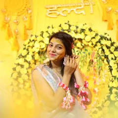 A beautiful, soft-focus portrait of the bride during her Haldi, with a warm yellow glow. Even amidst the chaos, we find moments to create artistic and flattering portraits.