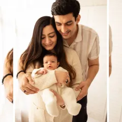 A classic family portrait with new parents holding their baby. We use soft, natural light in our studio to create a warm and inviting atmosphere.