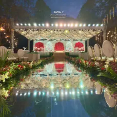 A breathtaking wedding aisle with a mirrored surface, reflecting the grand red and white stage and the sky above, creating a truly magical path for the bride.