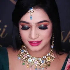 With eyes closed, you can fully appreciate the artistry of the eyeshadow blend. This look is perfect for a sangeet, reception, or any evening event where you want your makeup to make a statement.