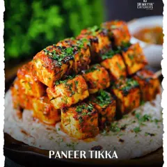 While our roots are in South India, our culinary skills know no bounds. Here is our Paneer Tikka, perfectly charred and spiced, representing the rich and diverse North Indian flavours we masterfully create.