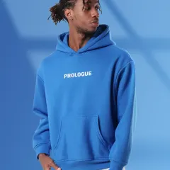 This vibrant shot of a men's hoodie against a colored backdrop shows how we make products pop. Our lighting ensures the fabric color is rich and the branding is clear, perfect for lookbooks and social media.