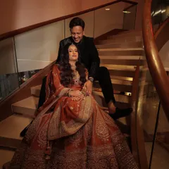 A beautiful portrait of the happy couple. The bride's minimal yet magical makeup look is perfect for her reception, allowing her natural happiness to shine.