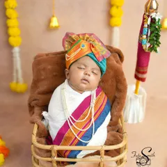 Celebrating new beginnings with a Gudi Padwa theme. This little one is dressed in traditional attire, complete with a tiny pheta, marking their first festival in the most adorable way.