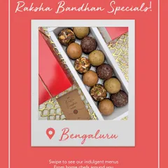 Celebrate the bond of Raksha Bandhan with our special homemade sweets. This image displays a beautiful box of assorted mithai, perfect for gifting or sharing with your loved ones.
