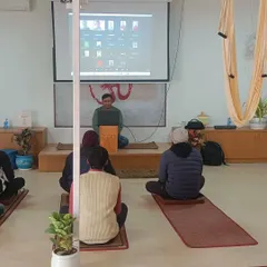 A closer look at our hybrid medical yoga workshop. I use a projector to ensure that my online students are fully integrated into the class, receiving the same level of attention as those present in the shala.
