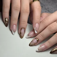 My signature isolated chrome design. I combine a clean French tip with abstract liquid gold chrome and a star accent for a look that is modern, artistic, and incredibly chic.