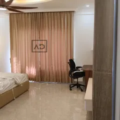 In this bedroom, the goal was to create a restful environment. I installed these floor-to-ceiling blackout curtains that block morning sun and provide complete privacy, complementing the room's calm and modern aesthetic.