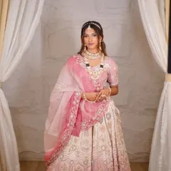 A fairytale wedding needs a dream lehenga. This beautiful pink and white ombre lehenga, paired with our rental jewellery, creates a truly magical bridal look.