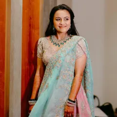 This bride wanted a simple and neat look for her reception. We chose a beautiful pastel lehenga and paired it with soft, glowing makeup and a simple hairstyle.