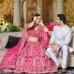 A duplicate of the previous image, showing the same joyful interaction and coordinated outfits.