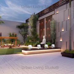 A wider view of the Aligarh front lawn design. The layout includes multiple seating areas, a large water feature with fountains, and a variety of trees and plants, all tied together with elegant wall lighting.