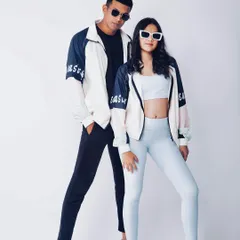 A stylish duo pose for an e-commerce catalogue. The clean white background and sharp lighting are standard for product listings that need to be clear and professional.