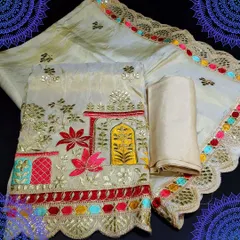 A festive unstitched dress material in a cream color. The top fabric features colorful embroidery depicting a traditional design, paired with a multi-colored gota patti border dupatta.