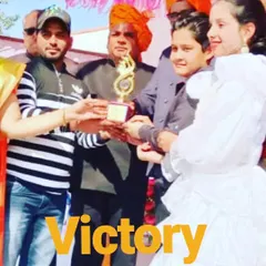 A proud moment captured as my students and I accept an award for our performance. We celebrate every victory, big or small, as a team.