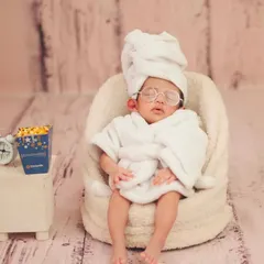 One of my favorite creative themes is the 'Infant Spa Day'. It's a playful and adorable way to capture your baby's personality. I ensure every prop is safe and comfortable for your little one.