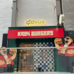 The exterior view of the Krok Burgers launch, showcasing the complete storefront branding and character cutouts we produced. Our work helps create a buzz and attract customers from the very first glance.