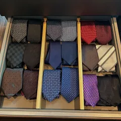 A drawer dedicated to a tie collection. We used simple dividers to create a custom rack, ensuring each tie is visible, protected, and ready to complete a formal look.