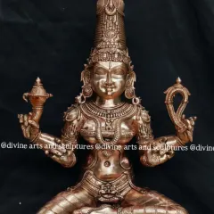 This is a bronze icon of Raja Rajeshwari, the "empress of empresses." Her regal posture and serene yet powerful expression are captured in the Chola style of our Swamimalai heritage.