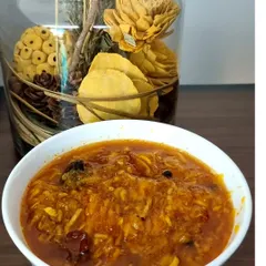 A bowl of my homemade Aam ki Chutney, with the perfect khatta-meetha (sweet and sour) taste. It is made with fresh raw mangoes and spices, with no vinegar or preservatives.