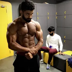 This most muscular pose highlights overall muscle density and conditioning. It's a clear demonstration of the results that come from intense, consistent training.