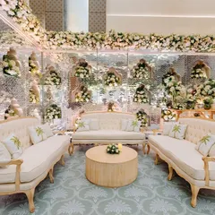 Step into the magic of the forest with our stunning seating arrangement. For this lounge, I used mirrored walls to reflect the lush florals, creating an immersive and enchanting space for guests to relax.