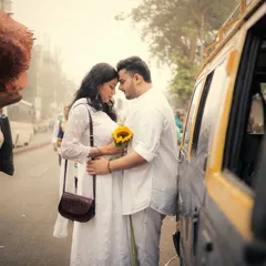 A quiet moment of connection on a busy Mumbai street, proving that love can create a peaceful bubble anywhere.