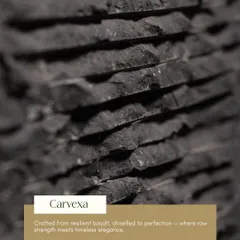 The 'Carvexa' texture, crafted from resilient basalt. This chiseled finish perfectly balances raw strength with timeless elegance, creating a powerful and sophisticated surface.