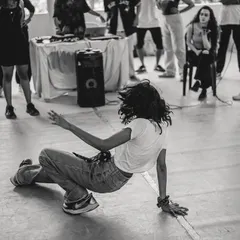 The cypher is where individual style comes alive. This moment from a Spectra dance battle captures the raw energy and freedom of freestyle. It's a space to test your skills, express yourself, and feel the support of the entire community.