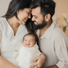 That first family photo with your newborn is pure magic. Look at that little smile! I focus on capturing the genuine love and happiness in these early days as you become a new family.