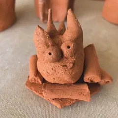 A whimsical creature sculpted by a student. It’s a perfect example of how pottery can be a playful escape from stress and pressure.