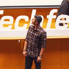 Looking up at the Techfest sign. A moment of reflection on my journey and how far I've come as an artist.