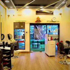 The front of our salon opens up to a bright and airy space, with a view of the greenery outside. We keep our product displays organized and accessible, so you can see the professional-quality brands we trust and use.