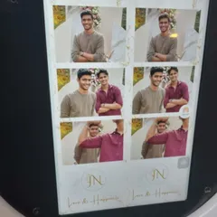 The classic photo strip gets a modern upgrade with our Strip Photo Booth. This booth at a wedding provides guests with instant, high-quality prints in a traditional multi-pose format, complete with custom logos and event details.